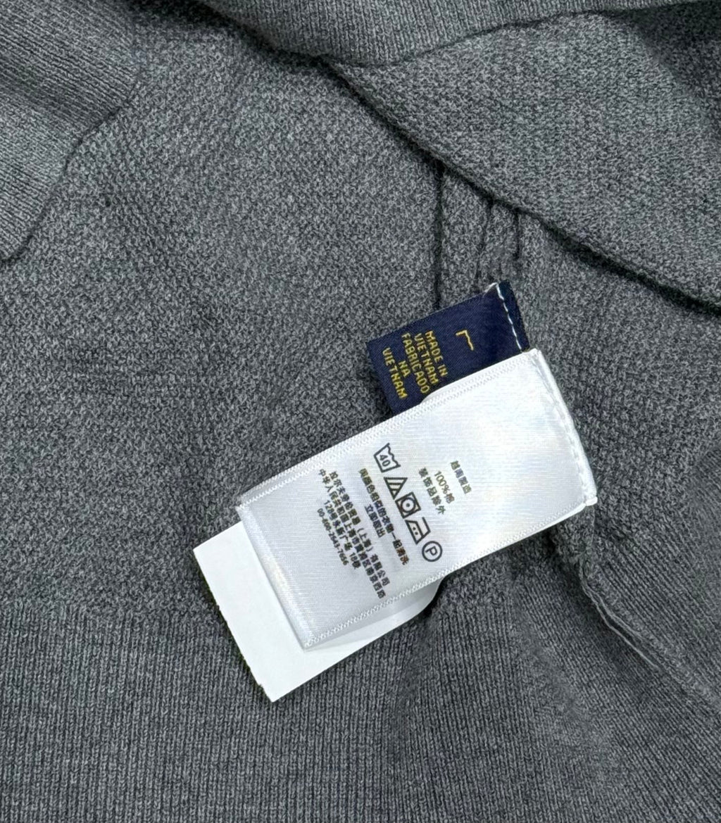 Ralph Lauren polo shirt interior care label and size tag near collar