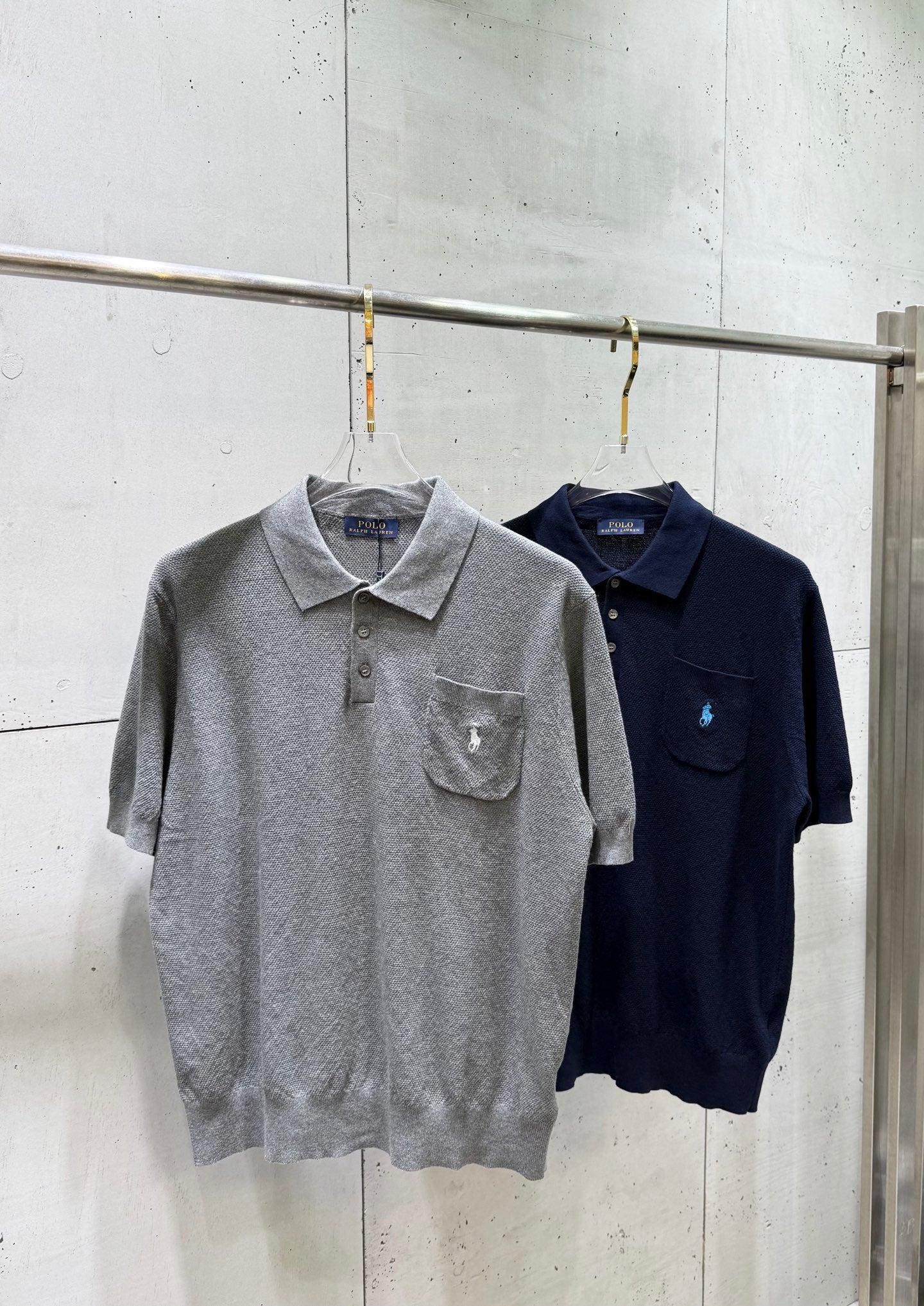 Ralph Lauren polo shirts in heather gray and dark navy, each with chest pocket