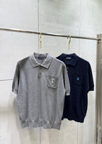 Two knit polo sweaters: light gray and navy, short-sleeve with pockets