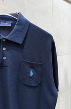 Navy knit polo sweater chest pocket with embroidered logo