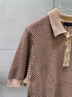 Knit polo shirt sleeve detail, ribbed cuffs, textured pattern knit, partial button placket