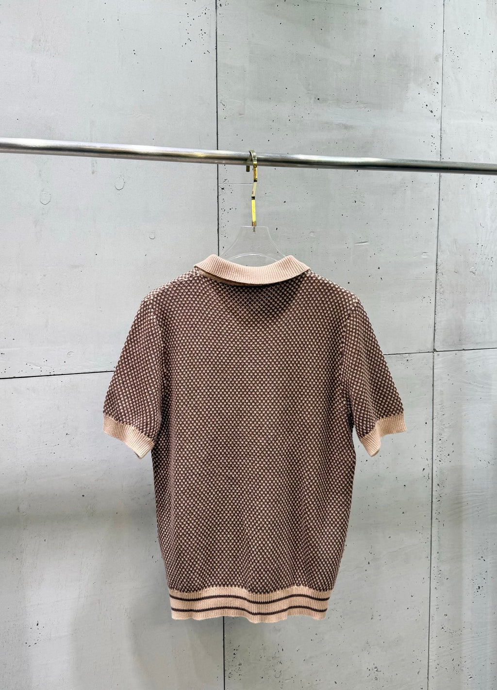 Knit polo shirt, short sleeves, ribbed hem with striped trim, back view