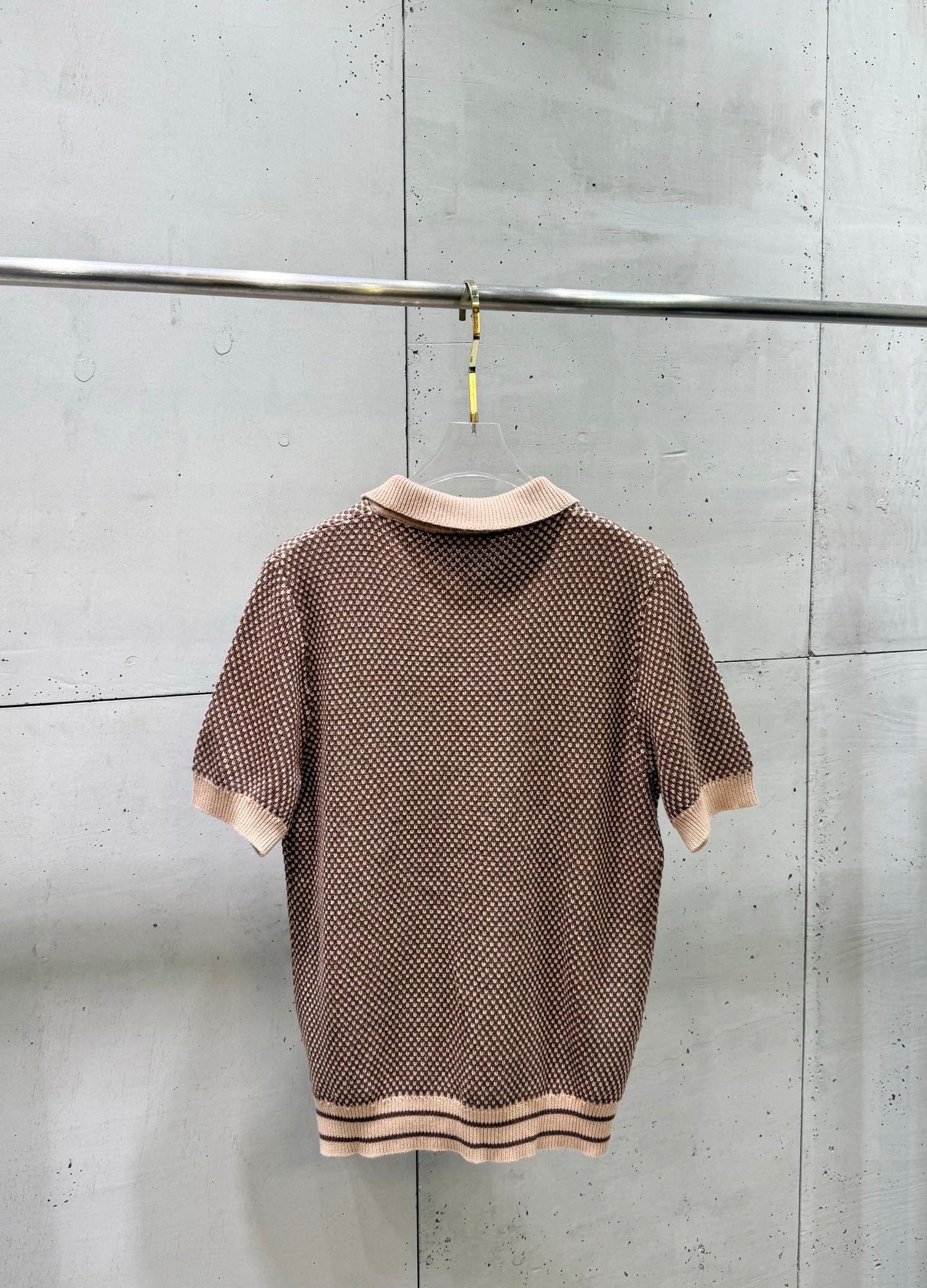 Knit polo shirt, short sleeves, ribbed hem with striped trim, back view