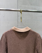 Knit polo shirt, back view, ribbed collar and knit texture with striped hem trim