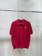 Prada red polo shirt with collar, button placket, and small chest logo