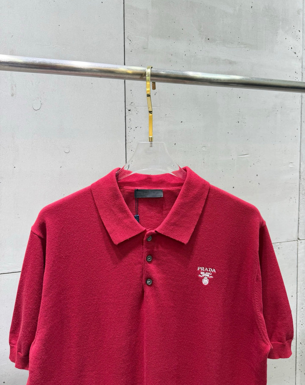 Prada red polo shirt with collar, three-button placket, and chest PRADA logo