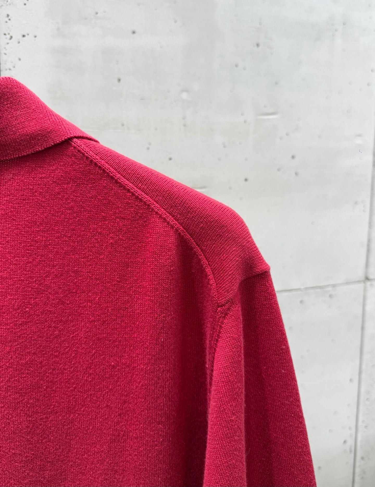 Prada red polo shirt shoulder and sleeve seam detail