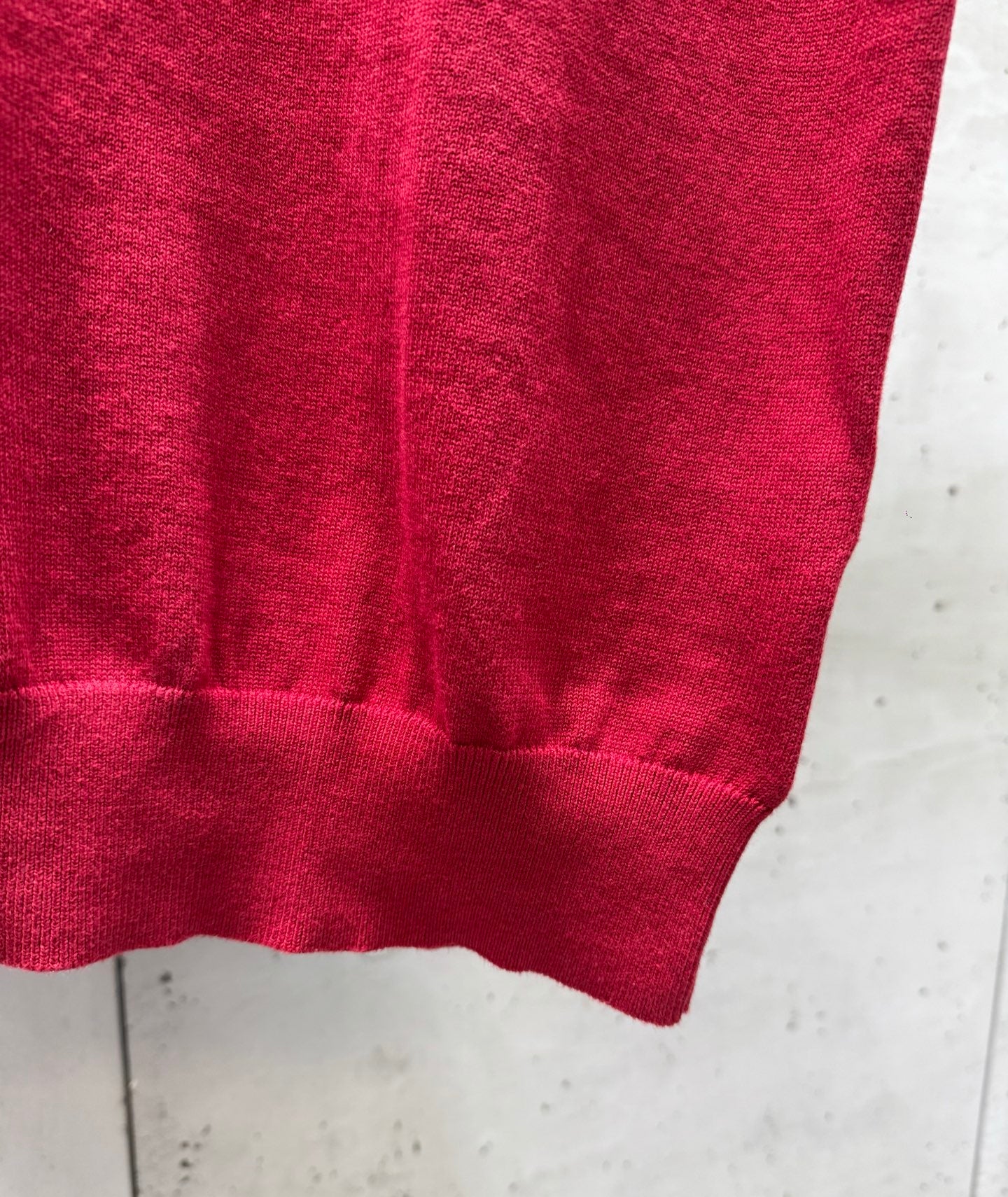 Prada red polo shirt bottom hem with ribbed trim