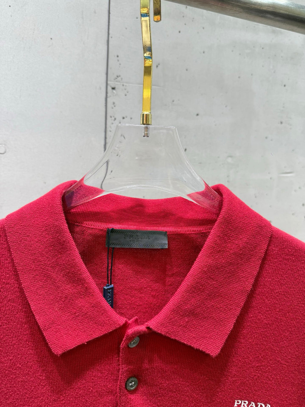 Prada red polo shirt neckline and placket with buttons and collar