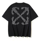 Black T-shirt with large geometric “X” logo print at center