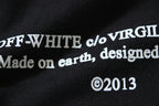Black T-shirt close-up of OFF-WHITE c/o VIRGIL graphic and ©2013