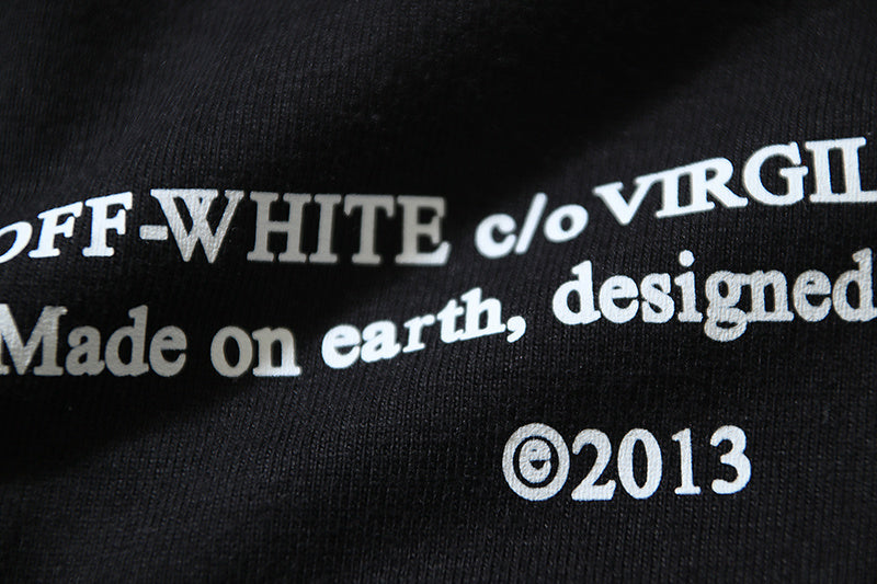 Black T-shirt close-up of OFF-WHITE c/o VIRGIL graphic and ©2013
