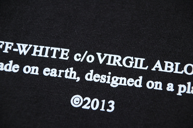 Black T-shirt with large OFF-WHITE c/o VIRGIL text graphic and ©2013