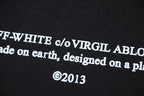 Black T-shirt with large OFF-WHITE c/o VIRGIL text graphic and ©2013