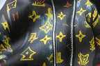 Black T-shirt close-up of character outfit with yellow stars and stripe detail