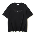 Black T-shirt with "WELCOME TO THE UNIVERSE" back text, crew neck