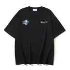 Black T-shirt with small left chest print and 'STAFF' text