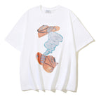 Off-white T-shirt with centered colorful shoe graphic