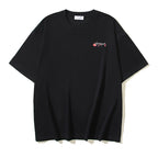 Black T-shirt with small colorful logo graphic on chest
