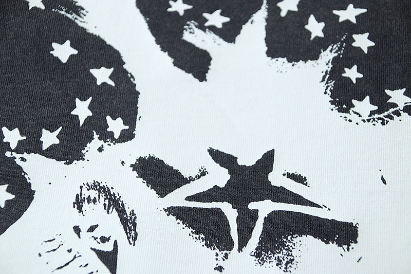 Distressed star-and-figure graphic print on dark crewneck T-shirt
