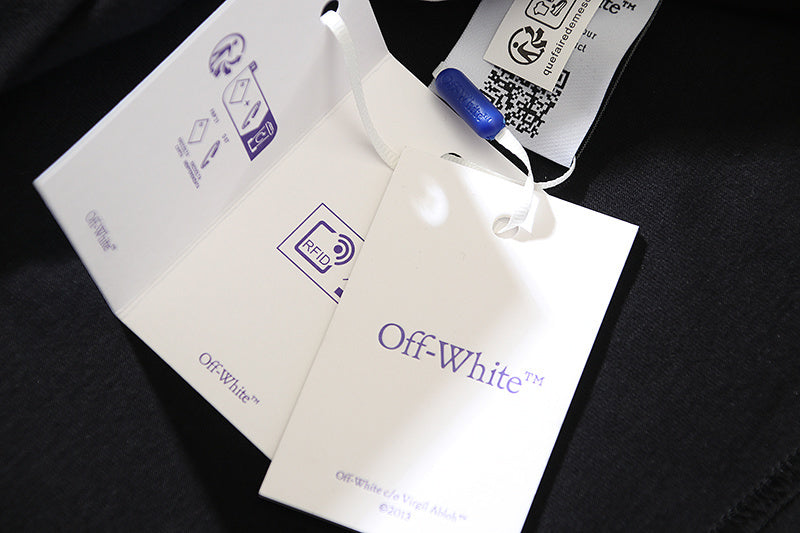 Off-White clothing hang tags with blue graphic and barcode labels