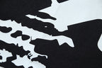 Off-White graphic T-shirt print detail with black silhouettes on off-white