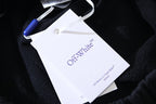 Off White clothing label on dark fabric with OffWhite text