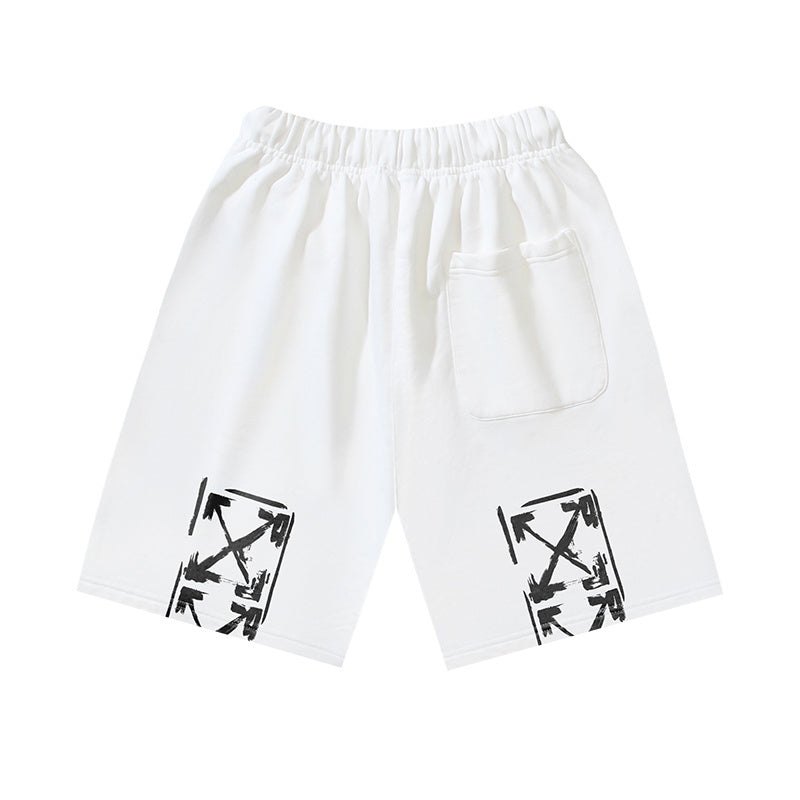 White shorts with graphic arrow print on both legs, elastic waistband