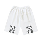 White shorts with graphic arrow print on both legs, elastic waistband