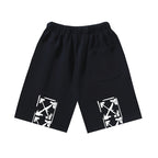 Dark shorts with graphic arrow print on both legs, elastic waistband