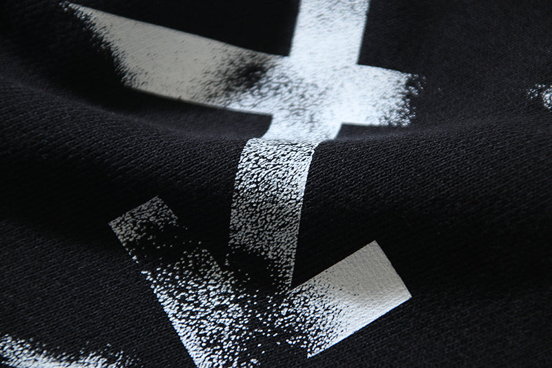 Black shorts with large white star logo print