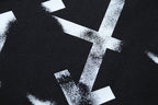 Black shorts with white Off-White star graphic print