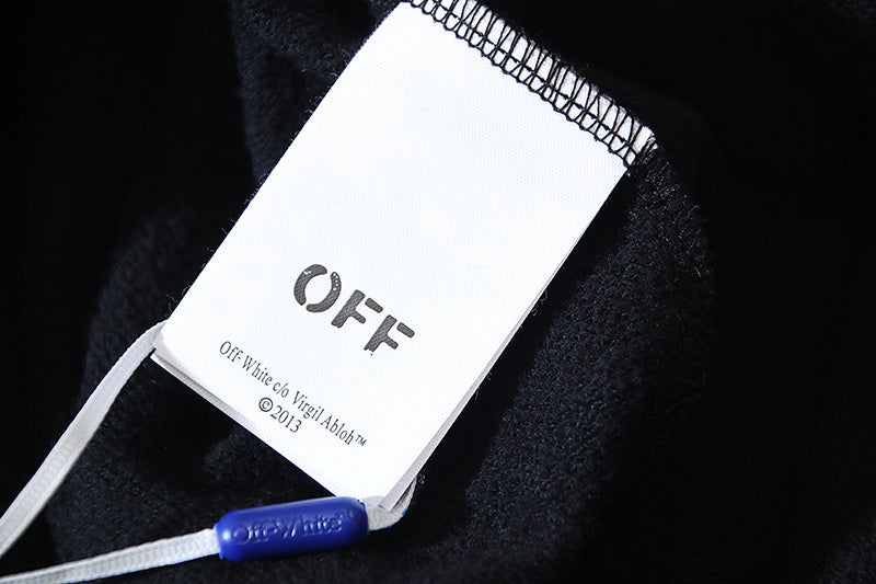 Off White white garment with brand label and blue snap detail