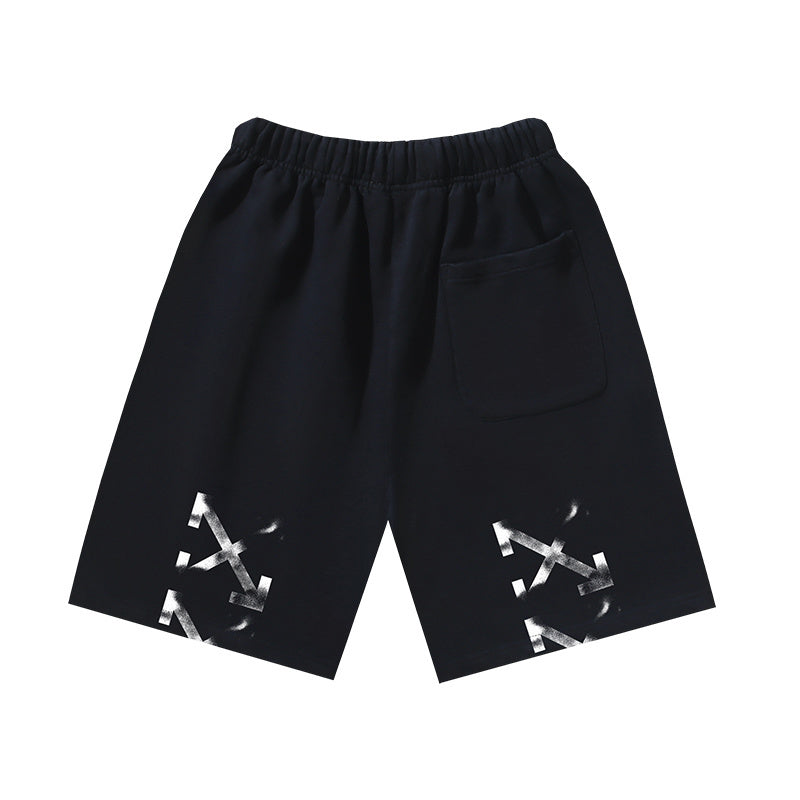 Dark shorts with elastic waistband, drawstring, and white graphic at hem