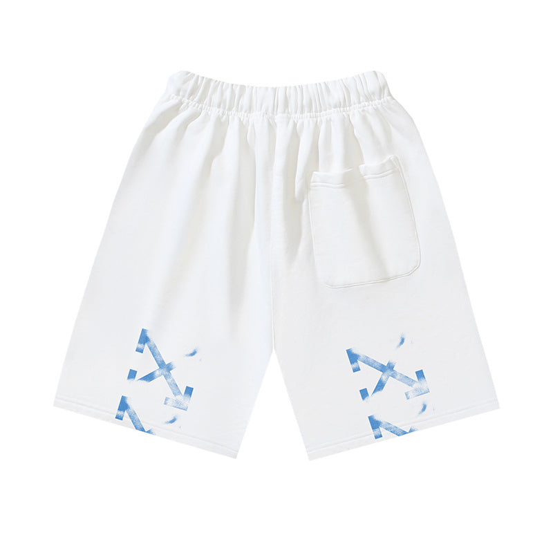 Off-white shorts with elastic waistband, drawstring, side pocket, and blue graphic