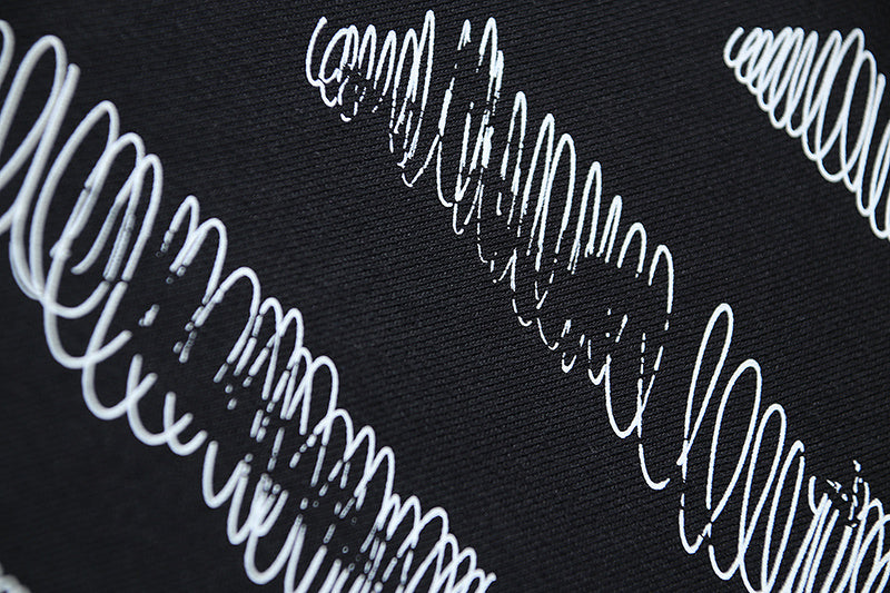 Off-White logo print on black fabric close-up
