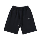 Black drawstring shorts with 'Off-White' logo on right thigh