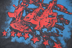 Black T-shirt front graphic with red figure and scattered red stars