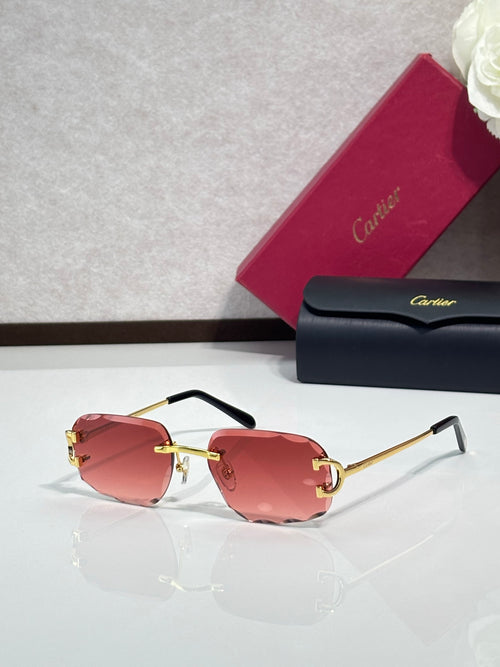 Cartier eyeglasses with pink gradient lenses, gold frame, black arms