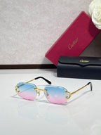 Cartier eyeglasses with blue-to-pink gradient lenses, gold frame, black arms