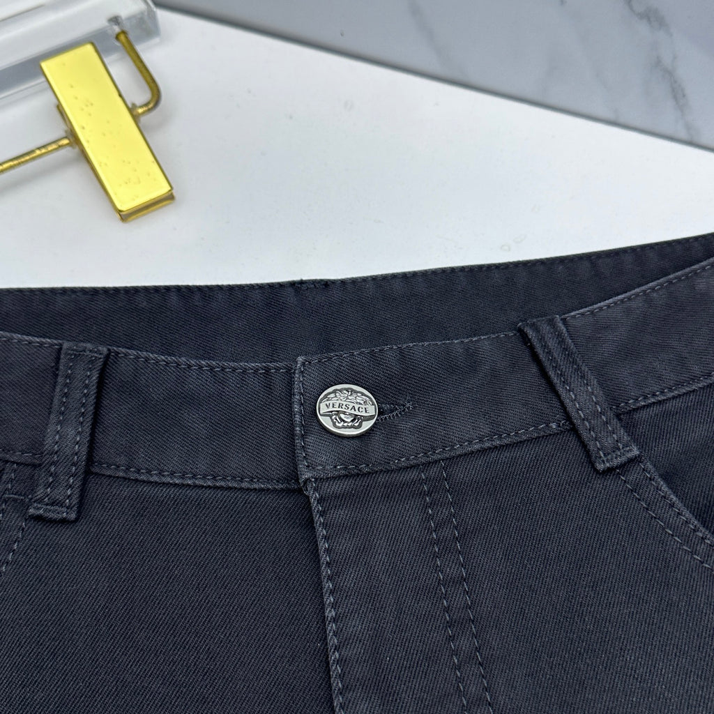 Versace dark blue jeans close-up of waistband with inner label and belt loops