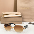 Bvlgari sunglasses with brown lenses and gold-tone frame hardware