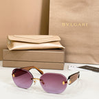 Bvlgari sunglasses with purple lenses and gold-tone frame