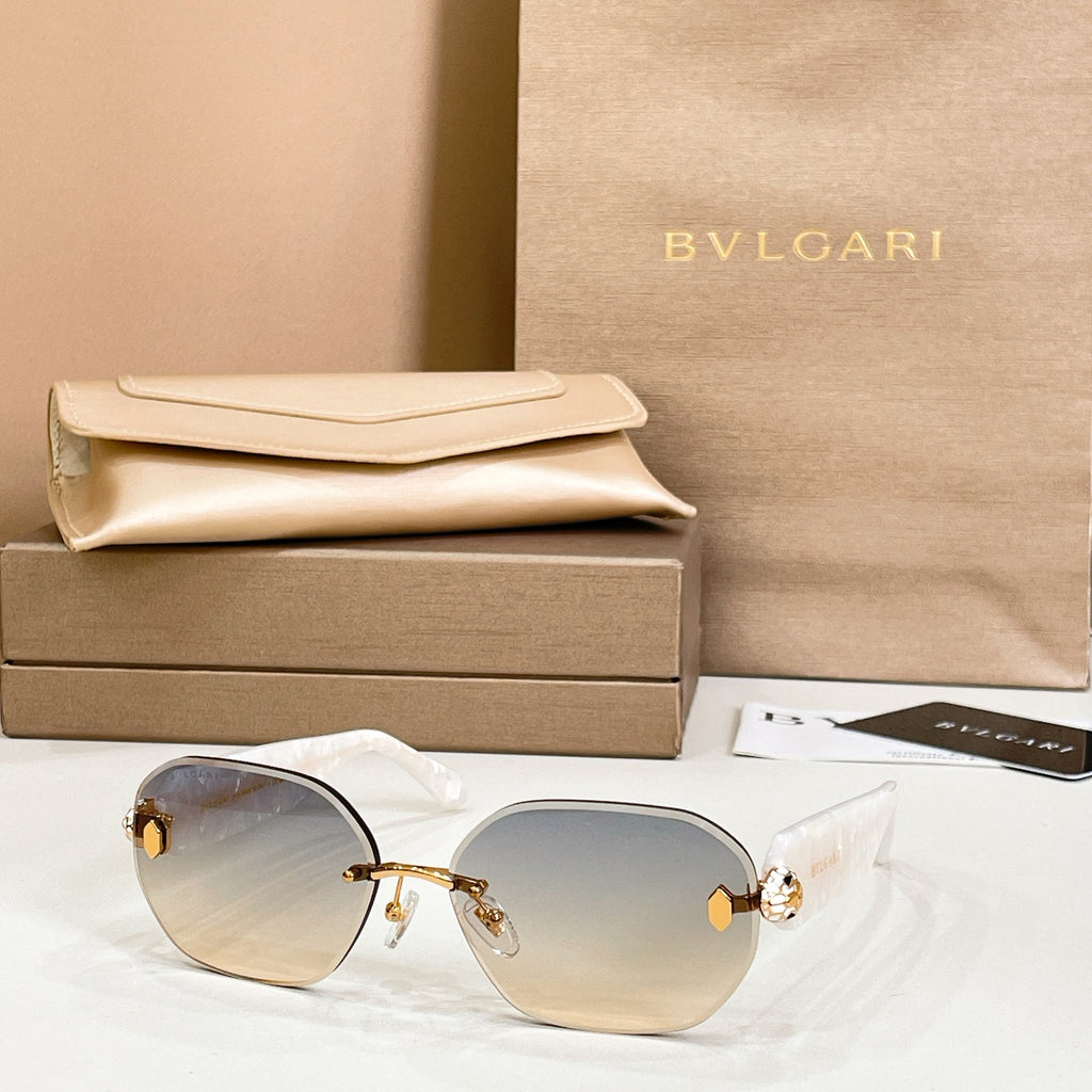 Bvlgari sunglasses with light lenses and gold-tone metal frame