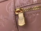 Louis Vuitton handbag top clasp with gold hardware on mauve embossed monogram leather