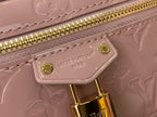 Louis Vuitton zipper pull and logo tag on mauve pink embossed mini handbag, gold hardware