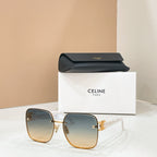 Celine sunglasses with blue-gray lenses and gold-trimmed frame, logo detail