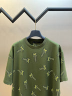 Green short-sleeve crewneck shirt with allover yellow LV-style logo embroidery