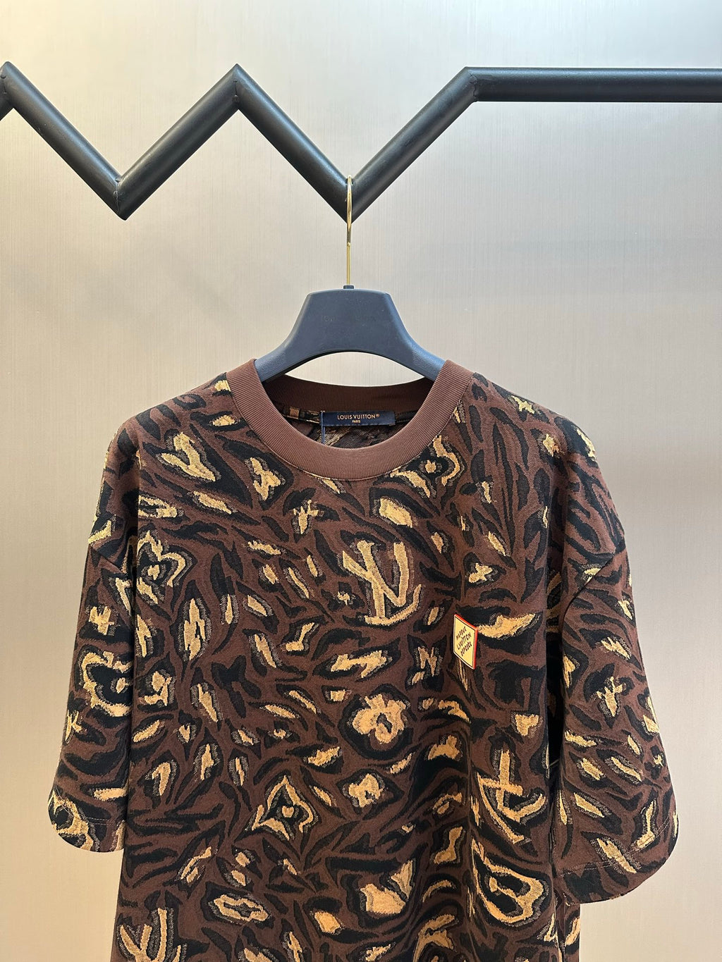 Louis Vuitton short-sleeve top with dark brown and gold abstract allover pattern, crew neck