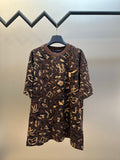 Louis Vuitton short-sleeve top in dark brown with gold allover pattern, crew neck